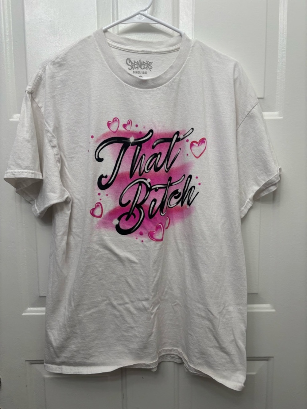 Spencer's White Graphic Tee with Pink and Black Script